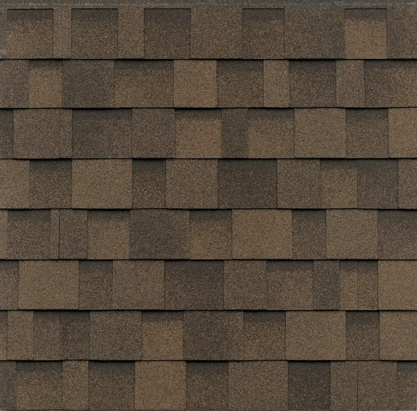 A repeating pattern of dark brown, multi-tonal asphalt architectural roofing shingles.