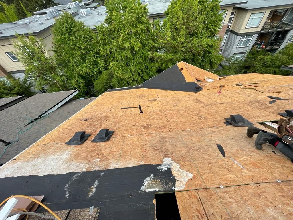 A roof that is being repaired with a lot of tools on it.