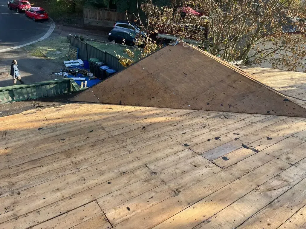 A wooden deck with a triangle in the middle of it.