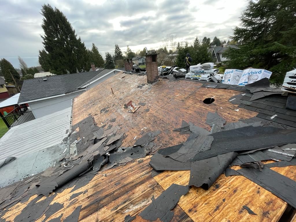 The roof of a house is being remodeled in surrey bc