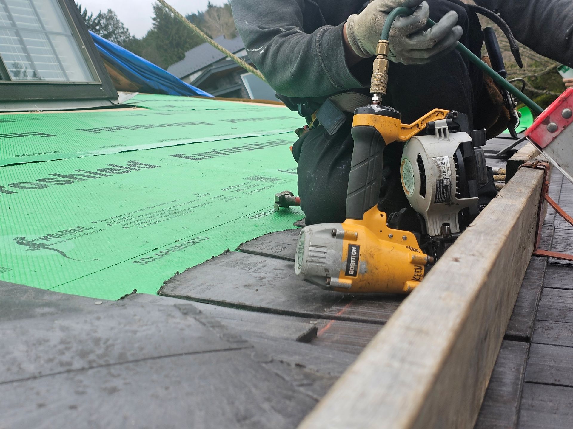 paragon roofing bc roofer on a vancouver roof 