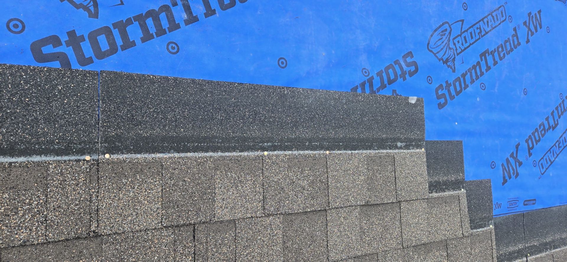 IKO Dynasty shingle courses laid against blue RoofNado StormTread XW synthetic underlayment, 229 St Maple Ridge BC, Paragon Roofing BC