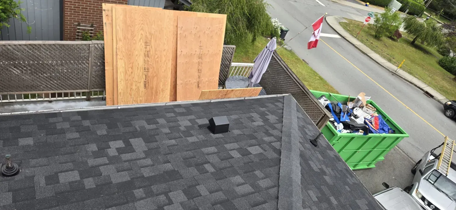 IKO UltraHP high profile ridge caps over continuous ridge venting on Thermal Drive Coquitlam cedar conversion, Paragon Roofing BC