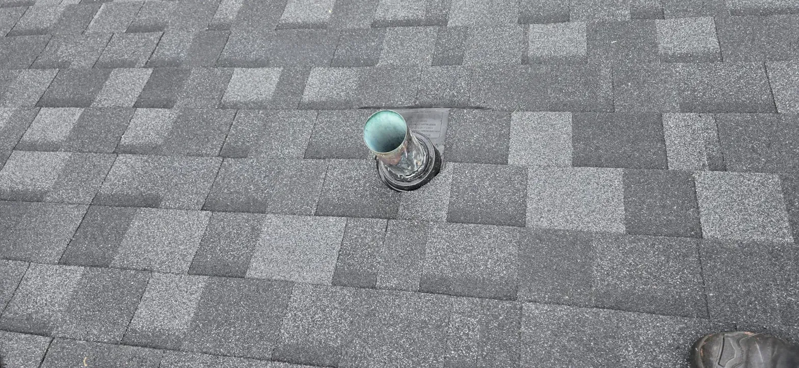 New rubberized plumbing stack boot sealed on Thermal Drive Coquitlam cedar conversion, Paragon Roofing BC