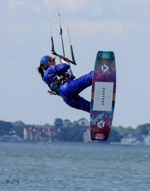Jennifer backroll jumping Kitebarding
