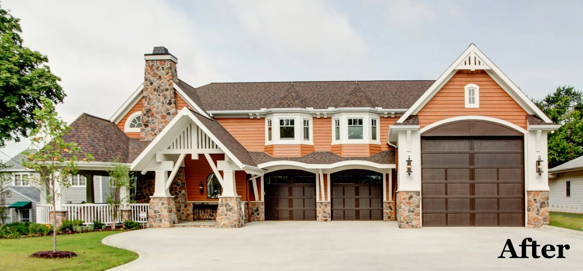 A before picture of a house with two garages