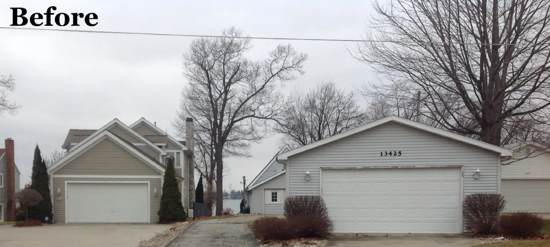 A large house with a lot of garage doors is shown after being remodeled.