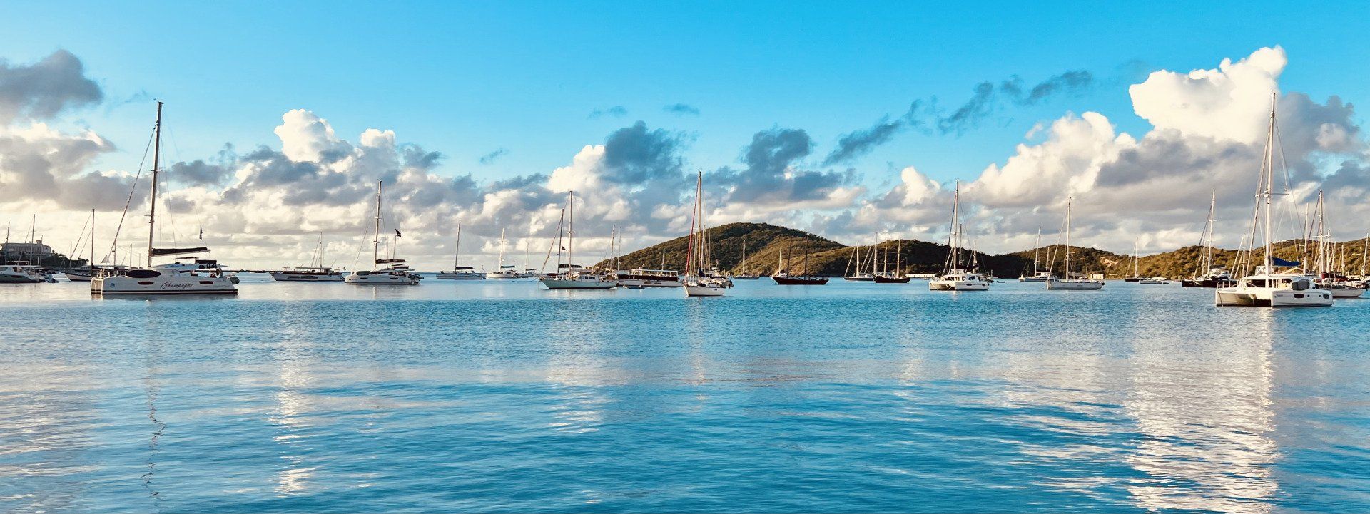 Beautiful ocean with boats in the middle