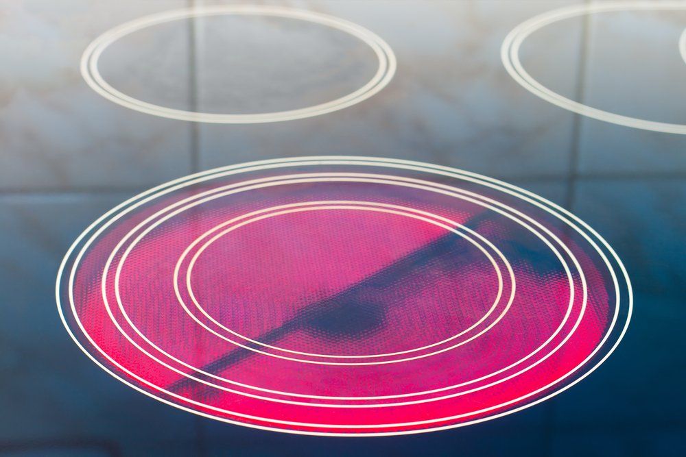 Un gros plan d'une plaque de cuisson avec trois cercles dessus