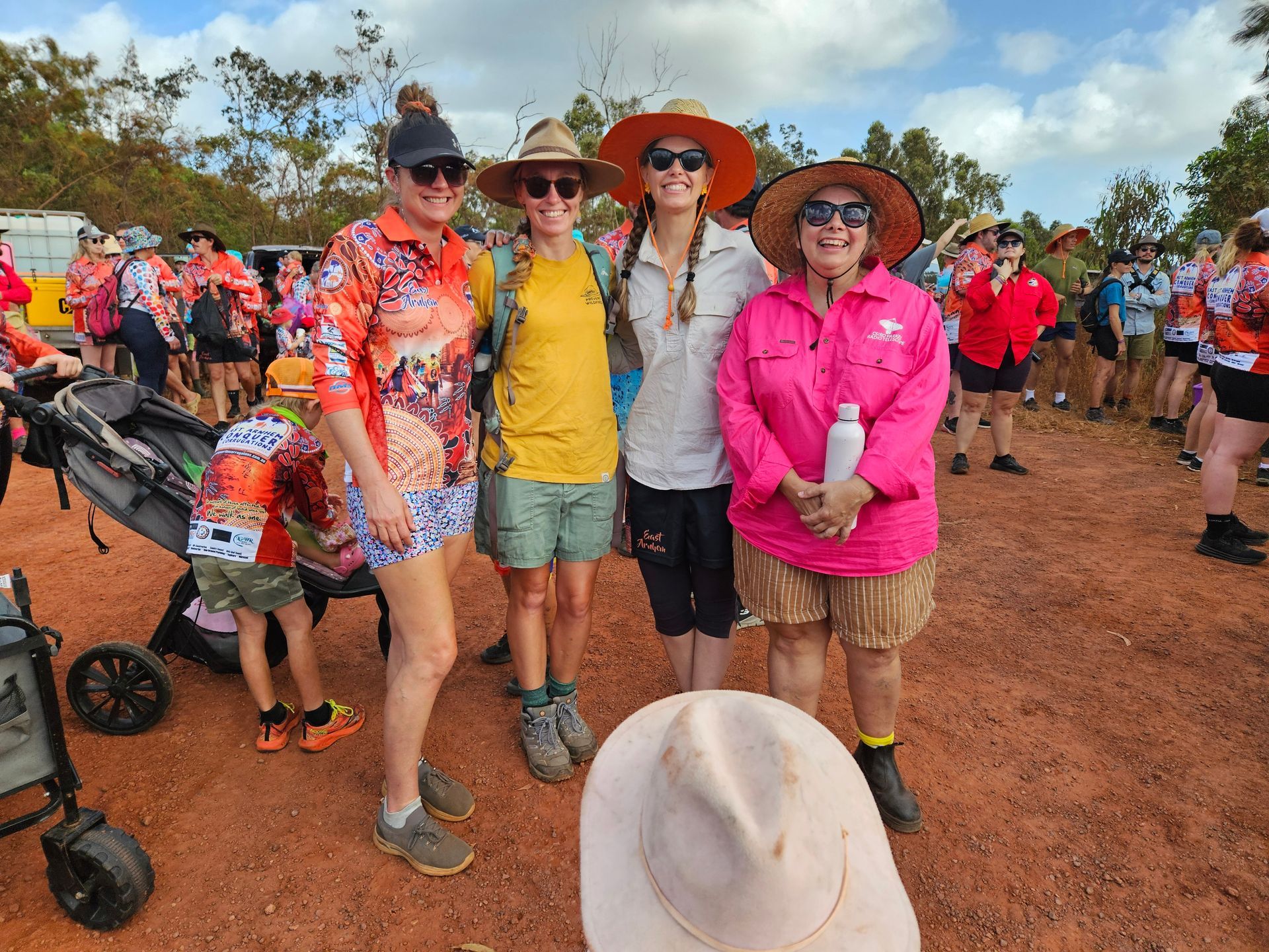 4 women standing together