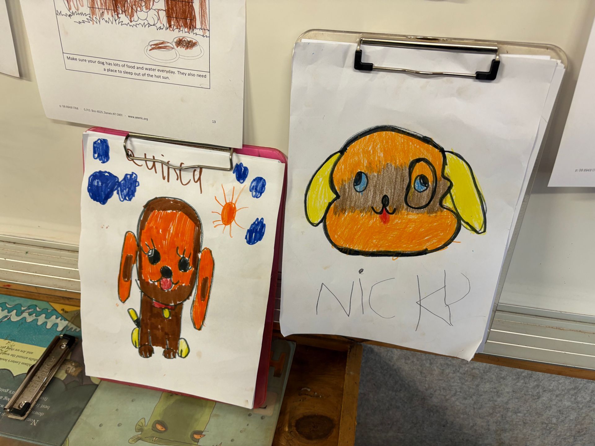 2 drawings of dogs