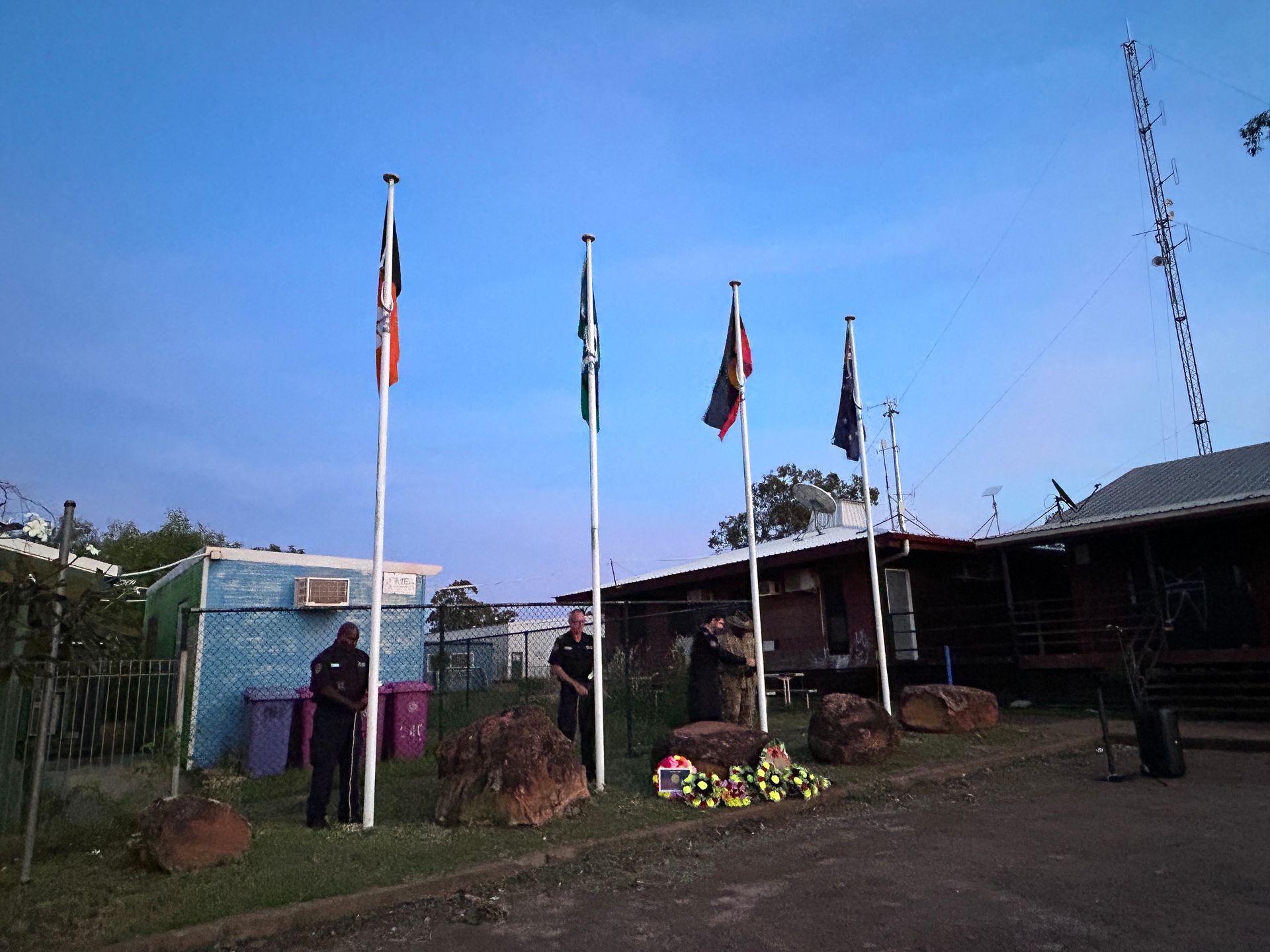 Four Flag poles. 