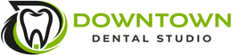 Downtown Dental Studio logo with black and green tooth icon and text