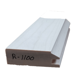 a white piece of wood with r-1100 written on it