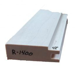 a piece of white plastic with the numbers r-1400 on it