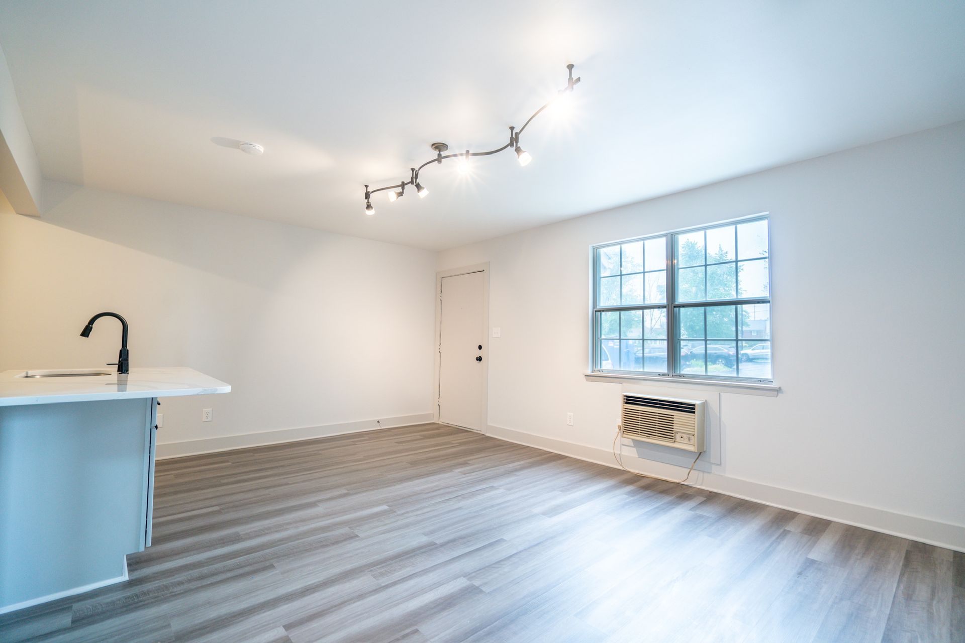 Photo of a white room with plenty of lighting