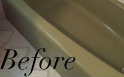 A muted, olive-green bathtub set against a textured, light-colored floor, labeled with the word