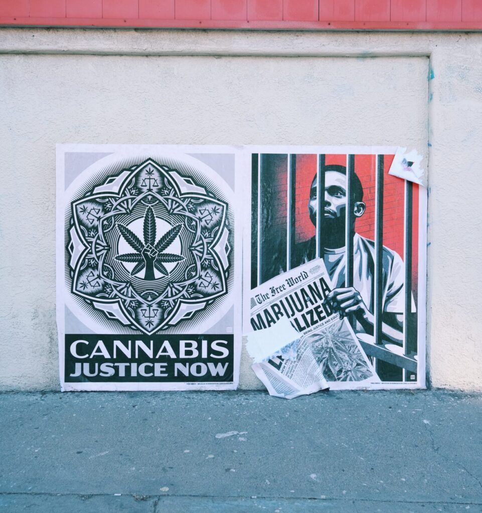 Two posters on a wall: 