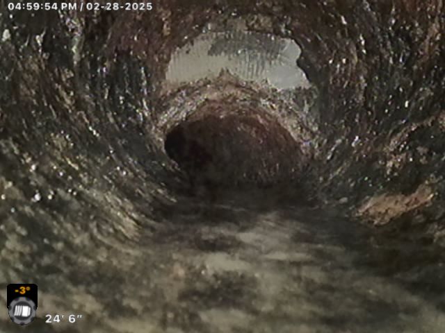 A picture of a tunnel with a time of 04:59:54 pm