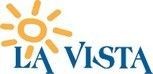A logo for la vista with a sun and the word vista.
