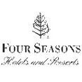 The logo for four seasons hotels and resorts has a tree on it.