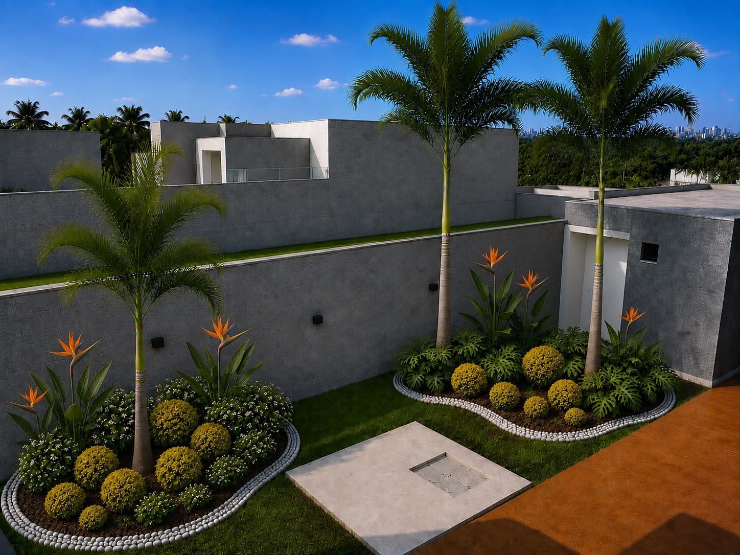 Patio moderno con palmeras, arbustos en flor, paredes grises y un camino pavimentado bajo un cielo despejado