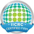 IICRC certified firm logo with blue and green globe and ribbon banner