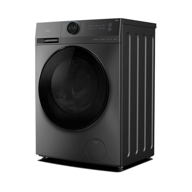 A black washing machine is sitting on a white surface.