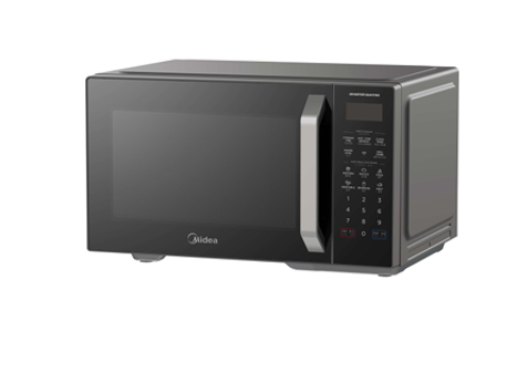A black microwave oven is sitting on a white surface.