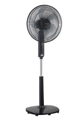 A black stand fan on a white background.