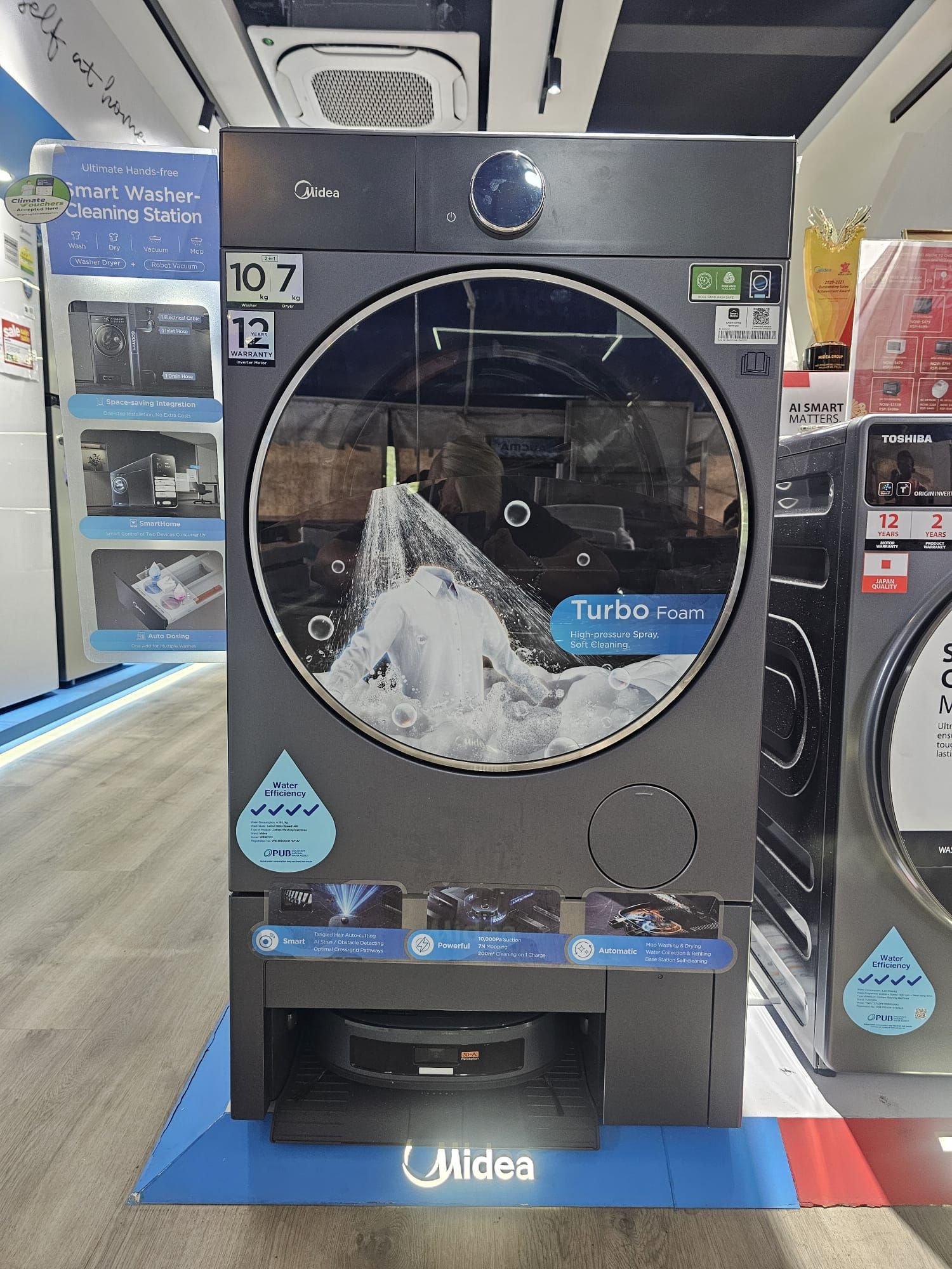 A washing machine is on display in a store.