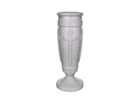 Gray decorative stone vase with carved cross-like patterns on a plain white background