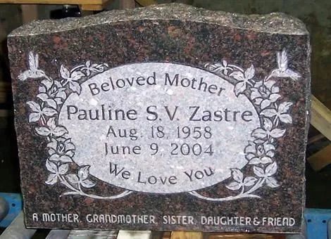 Gravestone with floral engraving reading “Beloved Mother” and “We Love You” for Pauline S. V. Zastre.