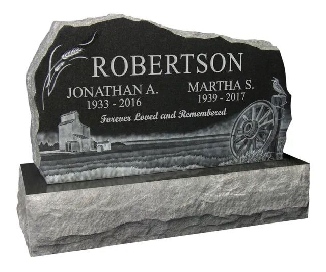 Black granite gravestone with Robertson and the names Jonathan A. and Martha, with wagon carving and dates