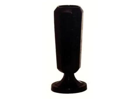 Black vase or goblet-shaped decorative object on a white background