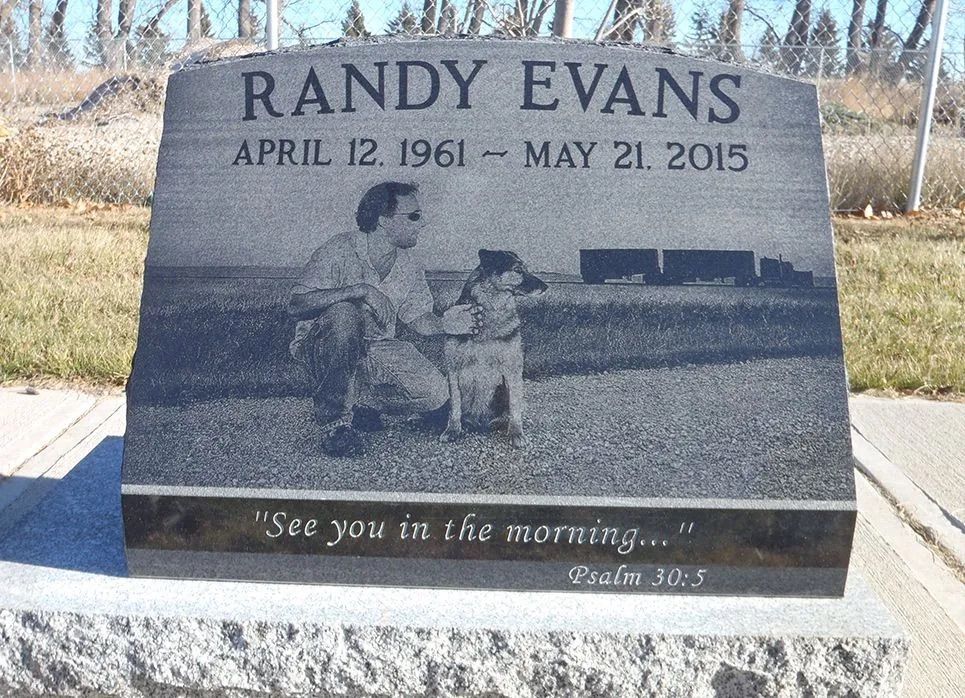 Gravestone for Randy Evans with engraved photo and the inscription “See you in the morning...”