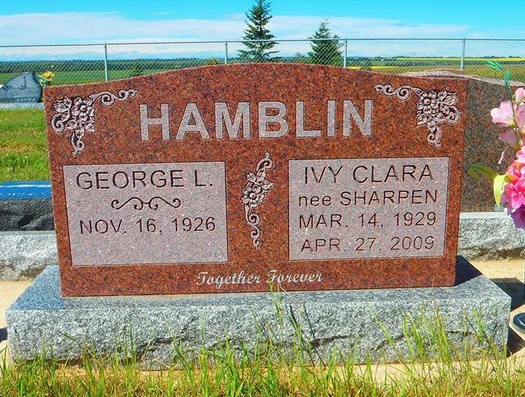 Hamblin family gravestone with George and Ivy Clara names, set in a grassy cemetery
