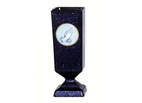 Tall dark blue glass trophy vase with a circular cameo medallion on the front
