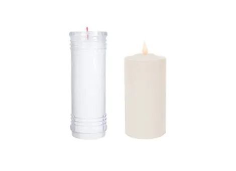 Two white pillar candles, one unlit and one with a small flame