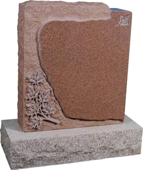 Red granite memorial headstone with floral carving on a gray base