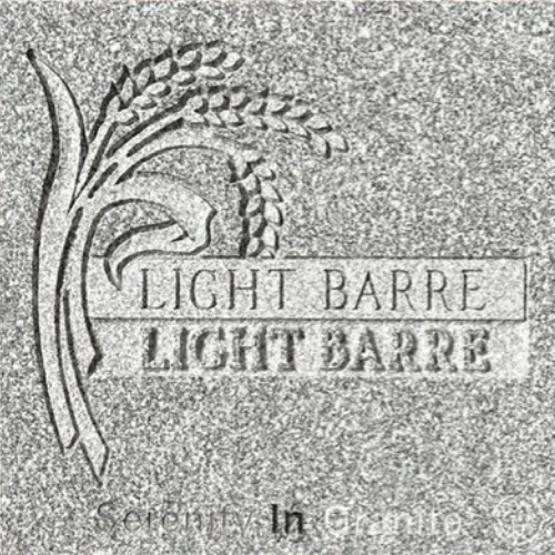 Light Barre granite plaque with carved wheat stalk and text engraved on stone
