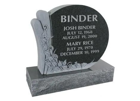 Black upright gravestone with engraved floral design and names on a gray base