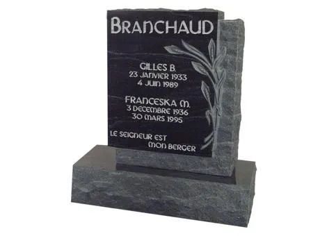 Black granite memorial headstone with engraved names and dates on a matching base.