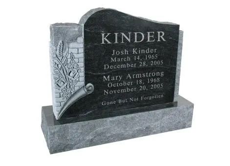 Gray granite memorial headstone with engraved names and a carved open book on the left side