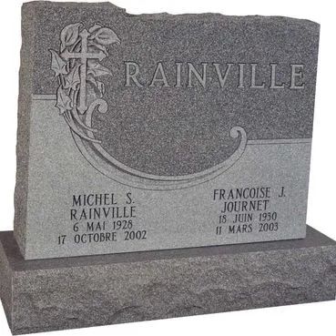 Granite grave marker engraved with the name RAINVILLE and two memorial plaques with dates.