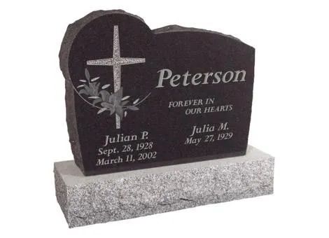 Black granite Peterson family gravestone with cross and engraved names on gray base