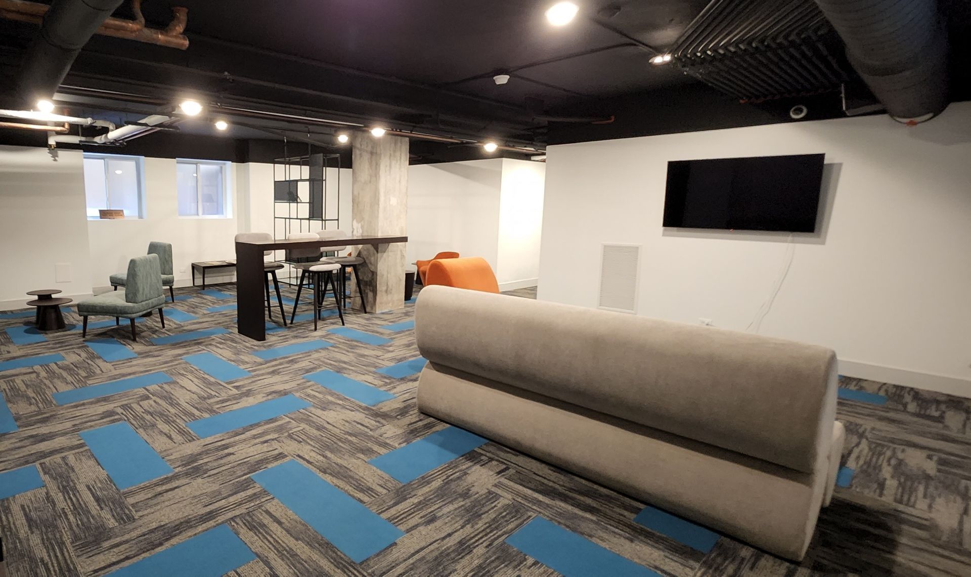 There is a couch in the middle of the room.