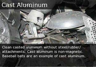 Pile of shiny cast aluminum scrap with a label reading “Cast Aluminum”