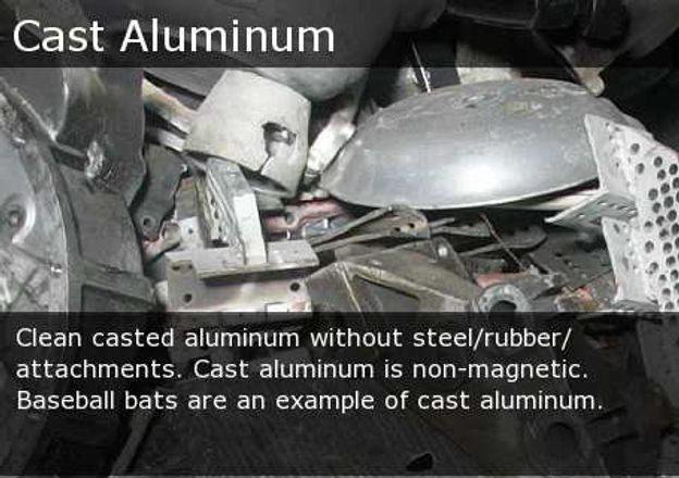 Pile of clean cast aluminum scrap, silver metal pieces labeled non-magnetic.