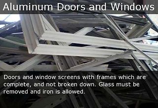 Stacked aluminum door and window frames with text about accepted materials and glass removal
